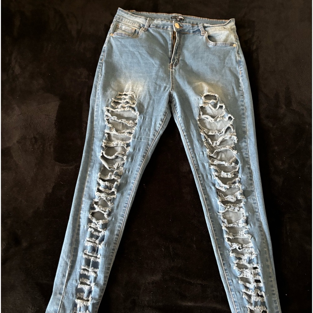 Light blue ripped jeans